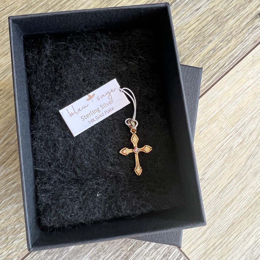 Cross pendant sterling silver with 14k gold plate with green crystals details